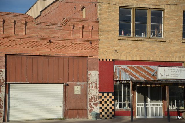 Brick storefronts on the main street in Hubbard, photographed in 2014